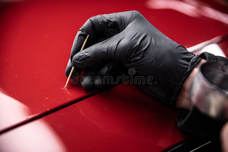 Employe of Car Paint Shop or Car Detailing Studio Performs a Paint