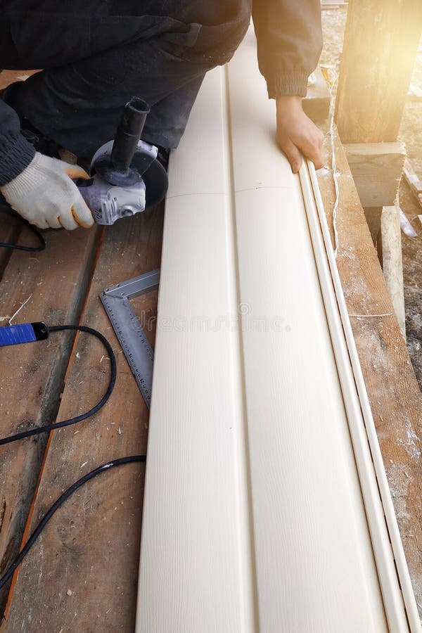 An Employee Cuts Siding To the Required Size Stock Image Image of