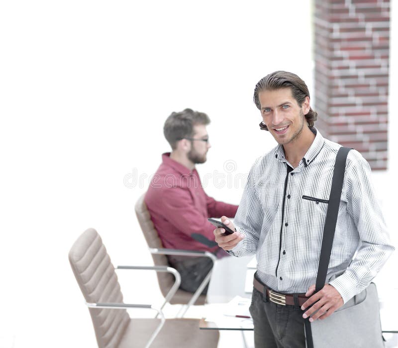 Employee reads a text message on smartphone royalty free stock photos