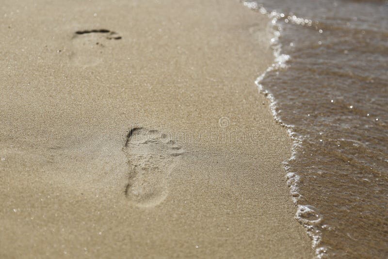 Empreintes de pas sur la plage photos stock Empreintes de pas sur la plage photos stock
