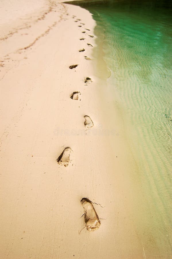 Footprints along the beach in Thailand. Footprints along the beach in Thailand.