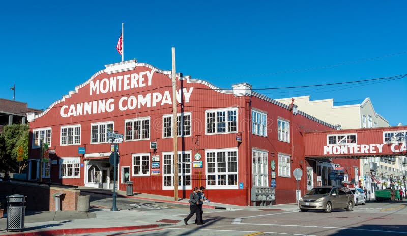 Monterey, CA - 18 February 2018. Monterey Canning Company in Cannery row is a popular tourist attraction in the city and was a sardine canning factory. It has a bridge over the road. Monterey, CA - 18 February 2018. Monterey Canning Company in Cannery row is a popular tourist attraction in the city and was a sardine canning factory. It has a bridge over the road.