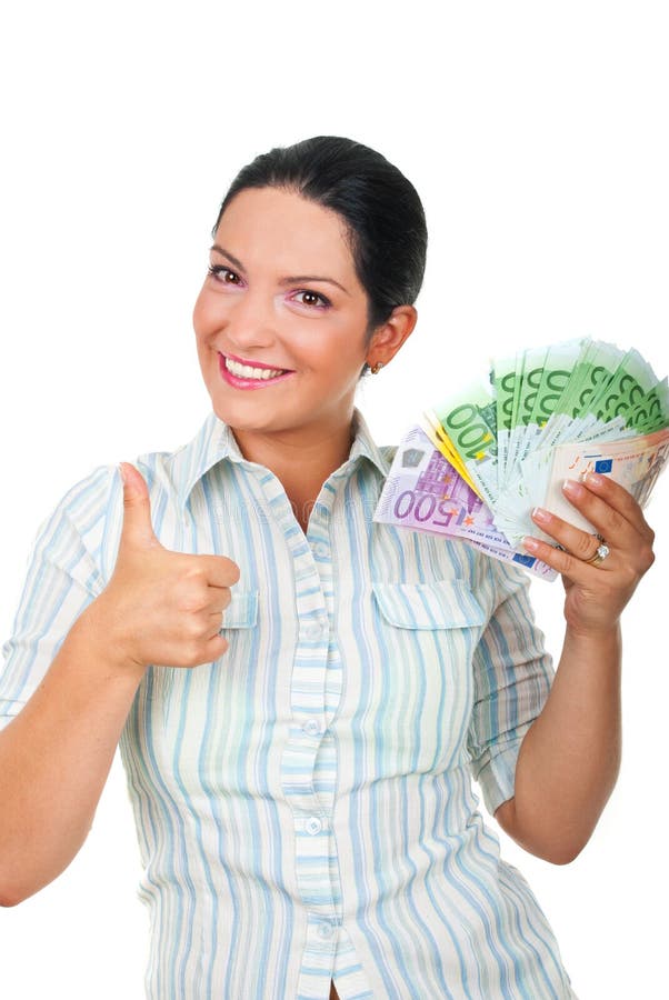 Empresaria con el dinero que da los pulgares para arriba foto de archivo libre de regalías Empresaria con el dinero que da los pulgares para arriba foto de archivo libre de regalías