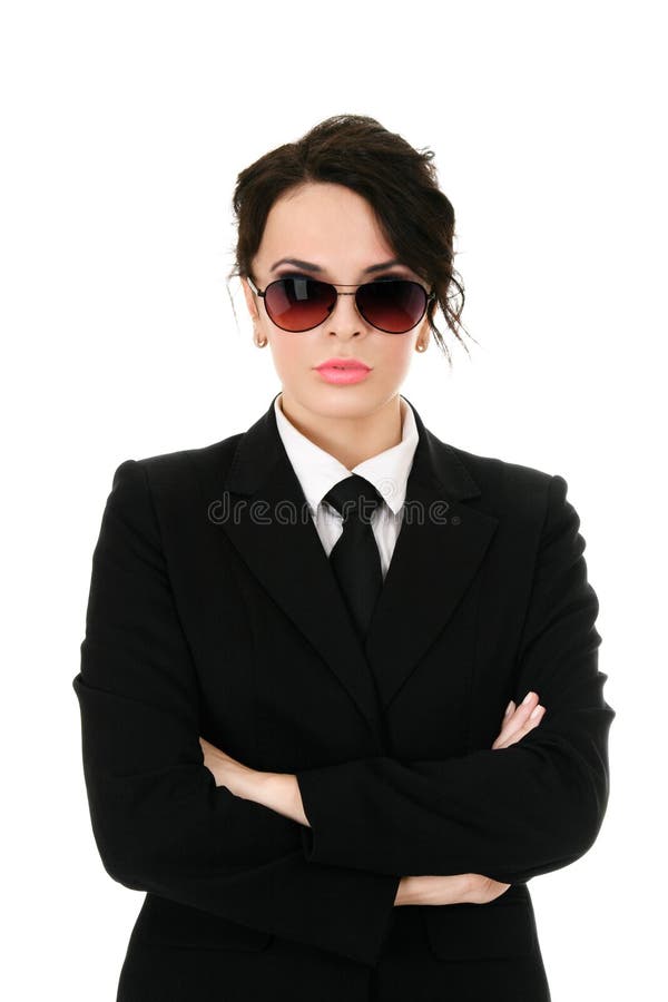 Serious businesswoman in black glasses isolated on white background. Serious businesswoman in black glasses isolated on white background