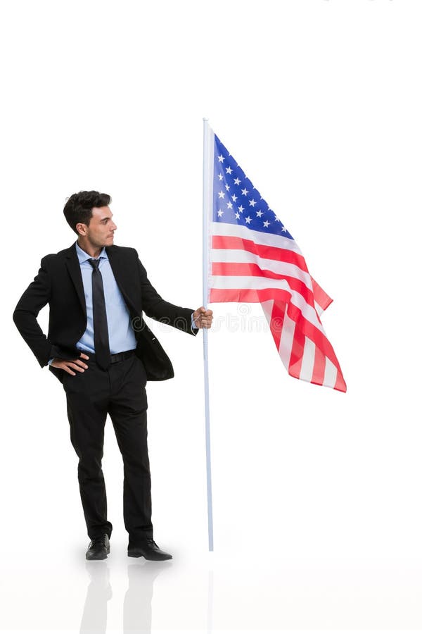 Empresario sosteniendo una bandera estadounidense