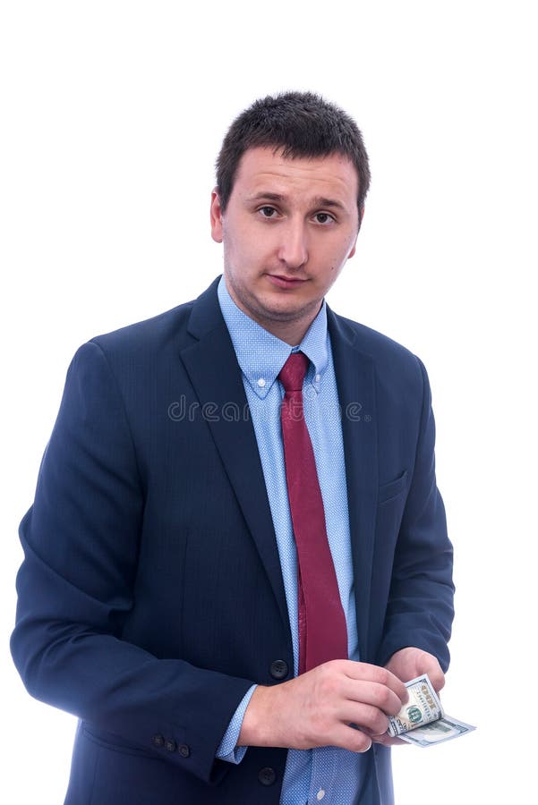 Empresário de fato segurando um pacote de dólares em mãos isolado em branco imagem de stock royalty free