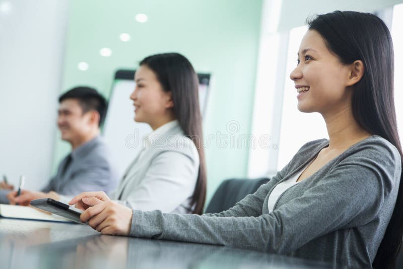 Empresários em uma reunião fotografia de stock Empresários em uma reunião fotografia de stock
