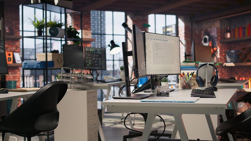 Empty AI tech agency workspace providing custom software development services stock photos