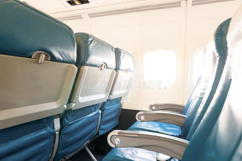 Empty aircraft seats and windows. Travel background stock photography Empty aircraft seats and windows. Travel background stock photography