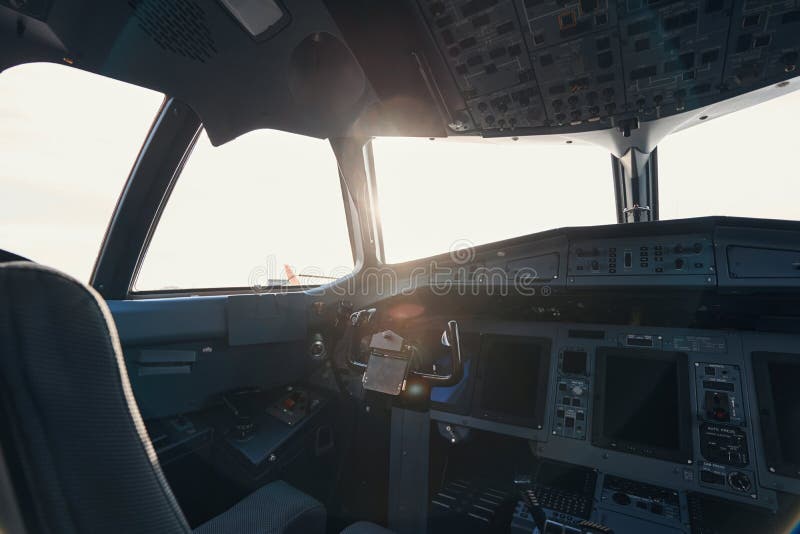 Empty Airplane Cockpit with Sun Shining through Window Stock Photo ...