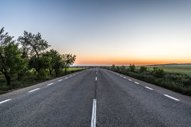 Empty Asphalt Road At Sunset Stock Photo Image Of Blue Outdoor