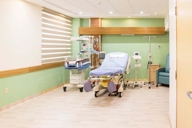 Empty bed in maternity ward at a hospital stock photos