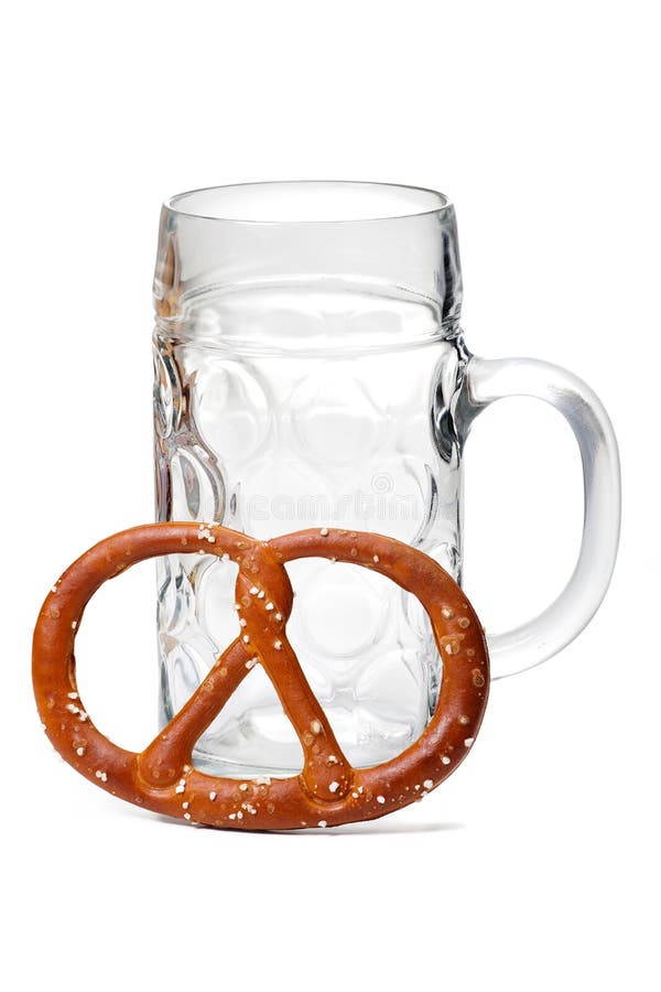 Empty beer glass with pretzel