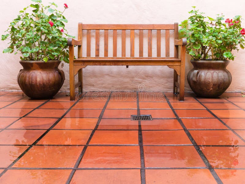 Empty bench in the rain