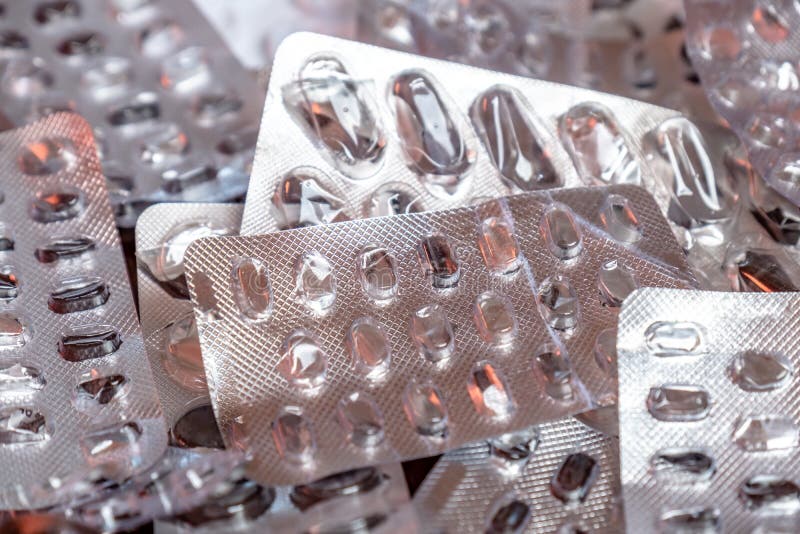 Empty Blister Packaging of Medicine Pills on Wooden Table Stock Image