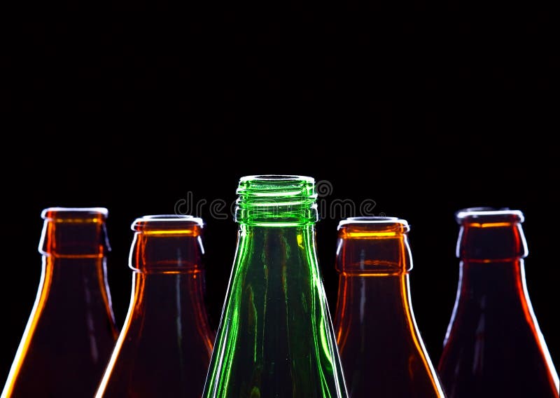 Empty bottles isolated on black