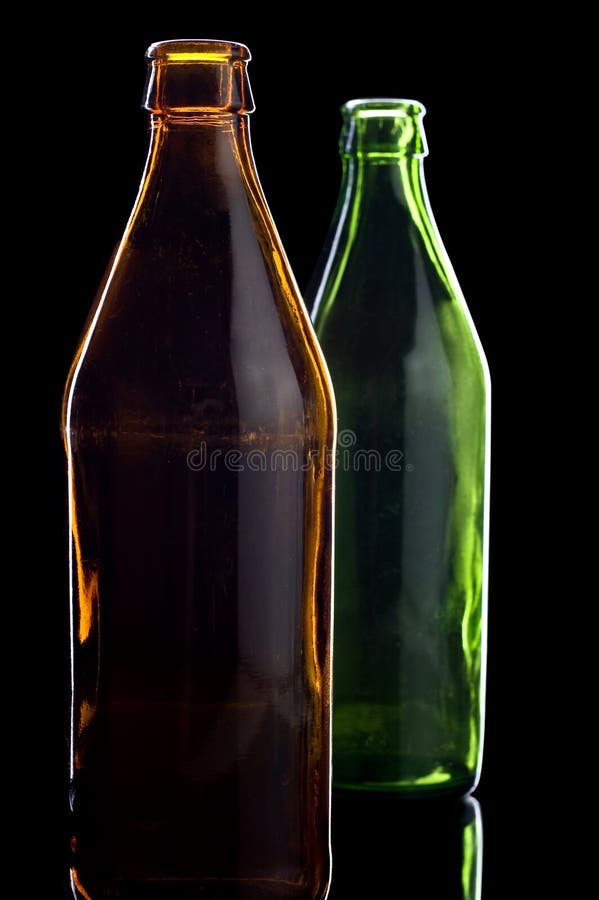 Empty bottles isolated on black