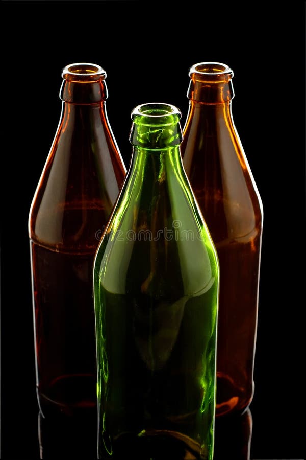 Empty bottles isolated on black