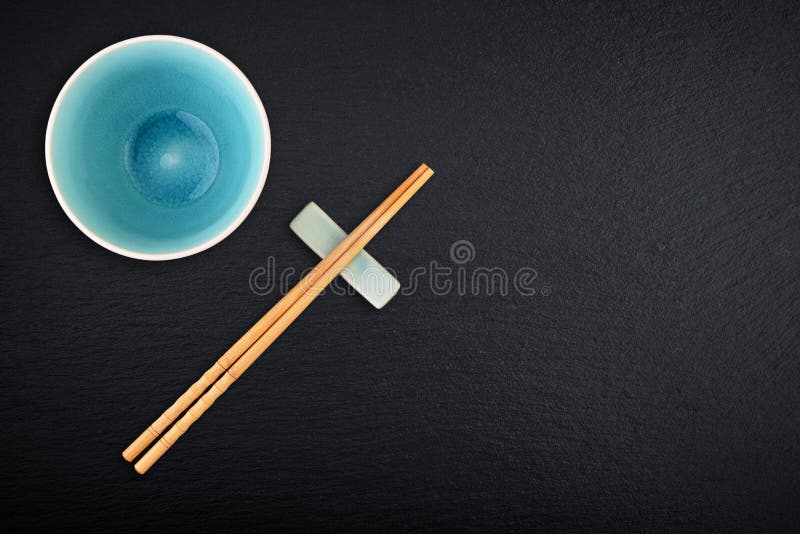 Empty bowl and bamboo chopsticks