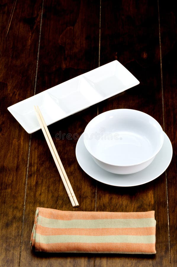 Empty bowl on dish with chopstick. stock photos Empty bowl on dish with chopstick. stock photos