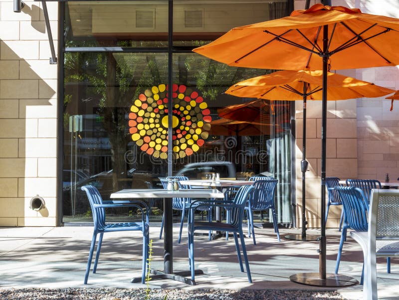 Empty cafe with tables and chairs