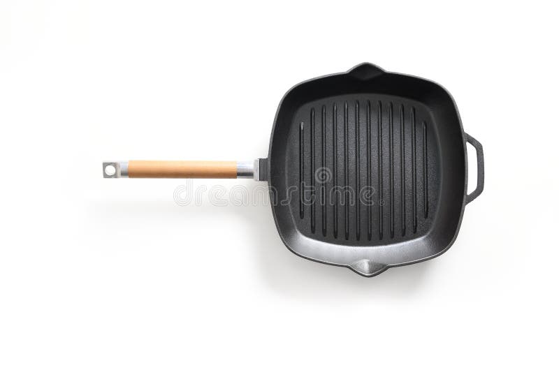 Empty new cast iron grill pan with wooden handle isolated on white background. View from above. Grill pan white background stock images, royalty-free photos and pictures