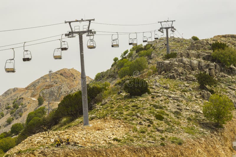 Empty Chair Lift on Mountainside in Summer Stock Photo Image of snowy