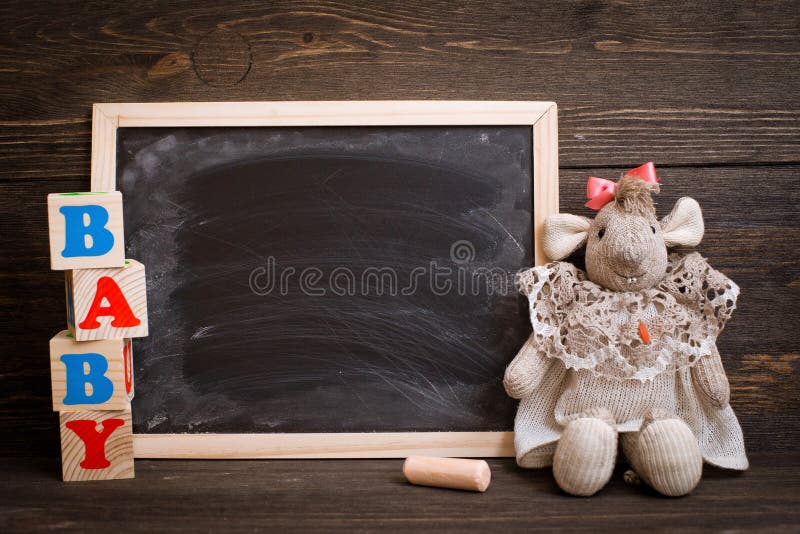 empty chalk board on wooden background