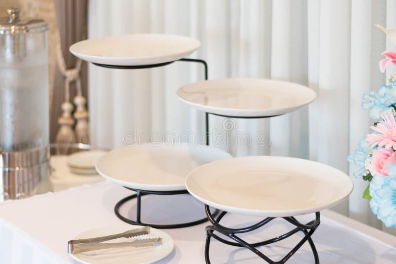 Empty clean dish on stainless metal plate stand royalty free stock photos