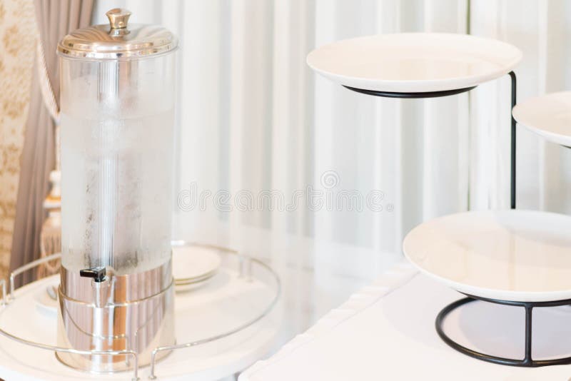 Empty clean dish on stainless metal plate stand stock photography