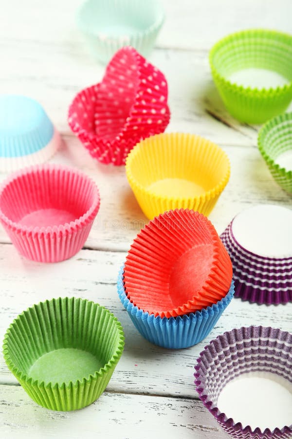 Empty Colorful Cupcake Cases on Wooden Background Stock Photo Image of paper, wrappers 47965570
