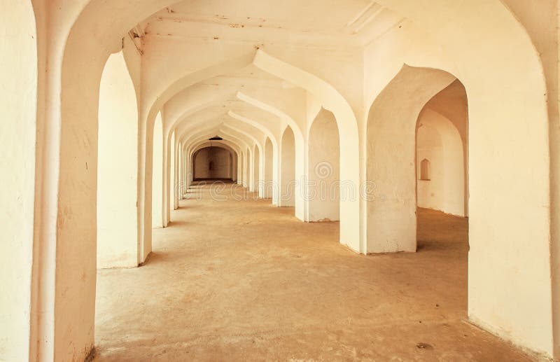 Empty corridor inside the ancient stone palace in India. royalty free stock photos Empty corridor inside the ancient stone palace in India. royalty free stock photos