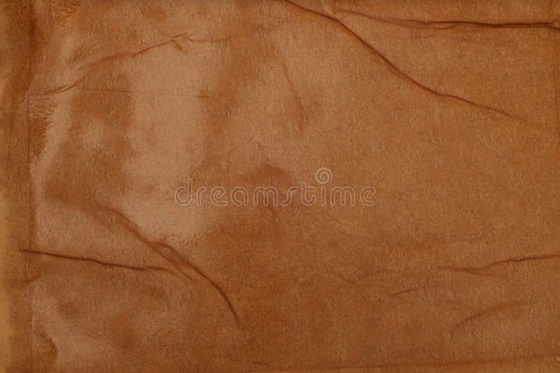Empty crumpled wet craft paper blank texture copy space wall background. Brown beige color stock photos