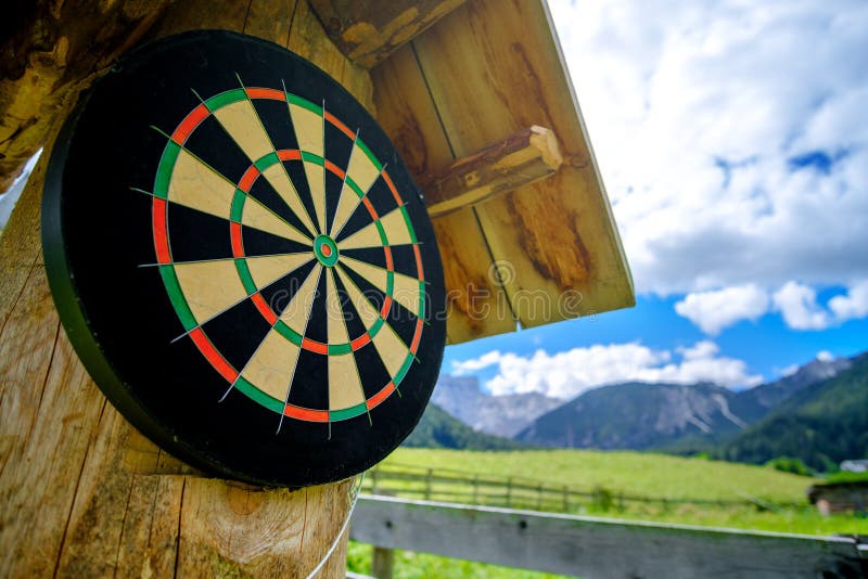 Dartboard on Old Wooden Wall. Stock Photo Image of score, scoring