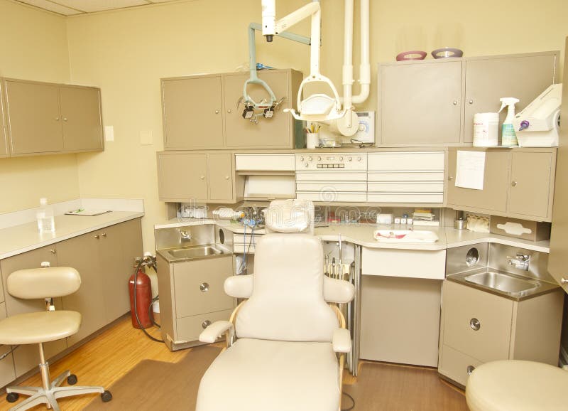 An Empty Dentist Chair in an Exam Room Stock Image Image of lamp
