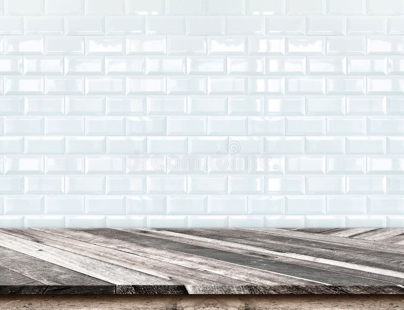 Empty Diagonal Wooden Table top at blurred white tiles ceramic w