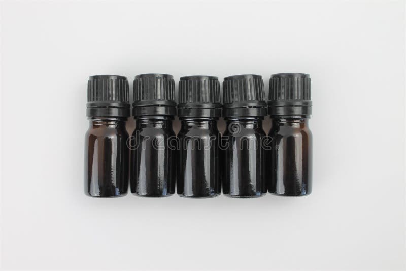 Empty Essential Oil Bottles on a White Background Isolated Stock Photo