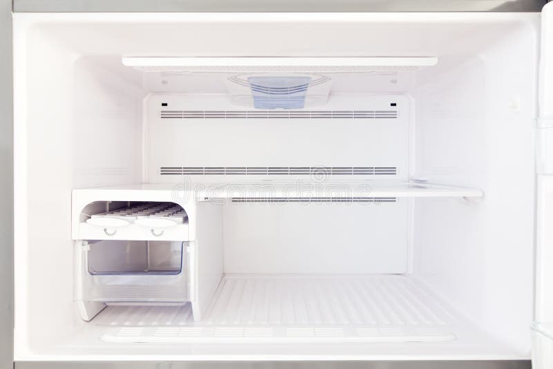 The empty freezer is a view inside. stock photo The empty freezer is a view inside. stock photo