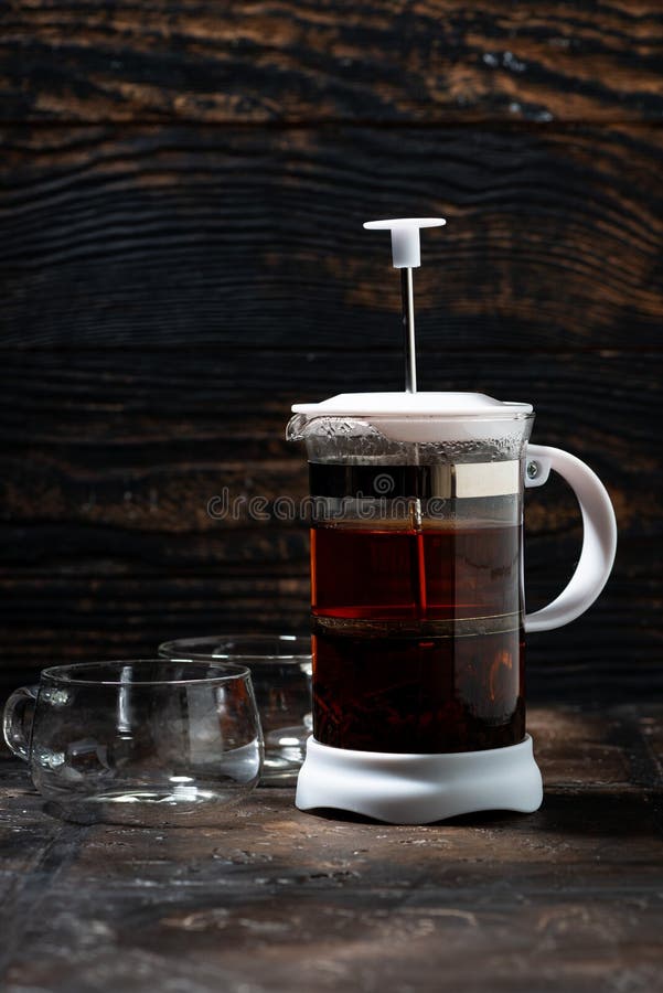 Empty French Press for Brewing Tea and Coffee on Dark Background