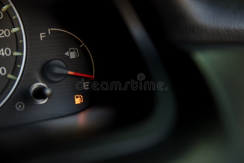 Empty Fuel Warning Light in Car Dashboard. Fuel Pump Icon Stock Image