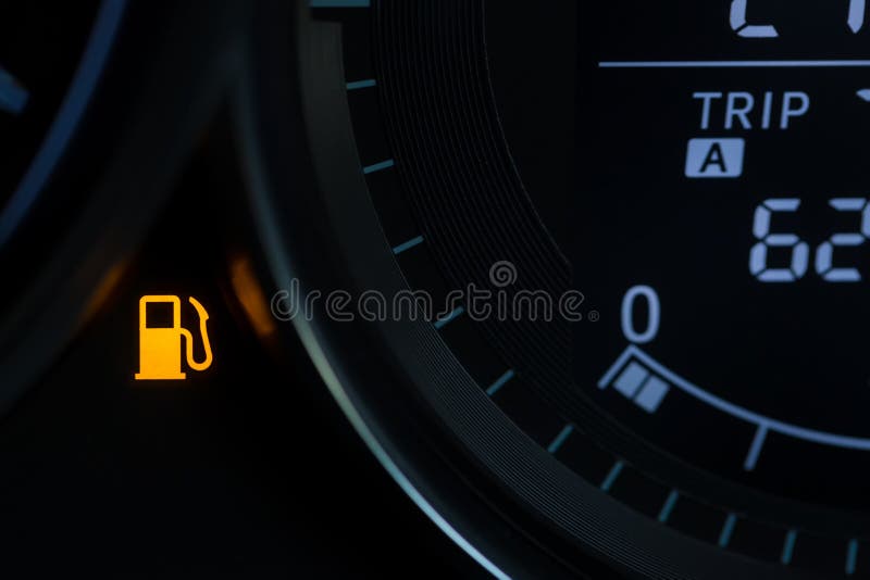 Empty Fuel Warning Light in Car Dashboard. Fuel Pump Icon Stock Photo
