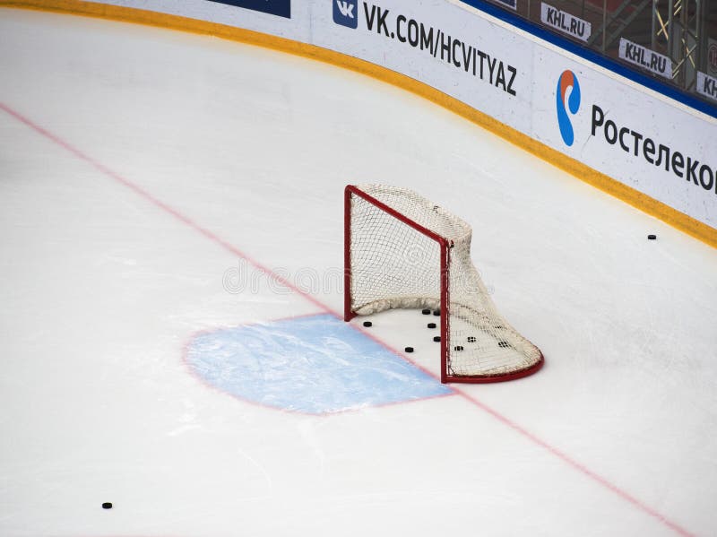 Empty gate with lots of pucks stock images Empty gate with lots of pucks stock images