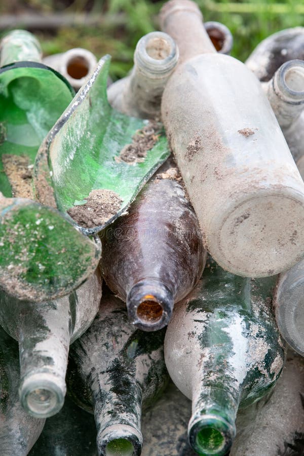 Empty Glass Bottles in a Pile. Waste Collection and Sorting Stock Photo