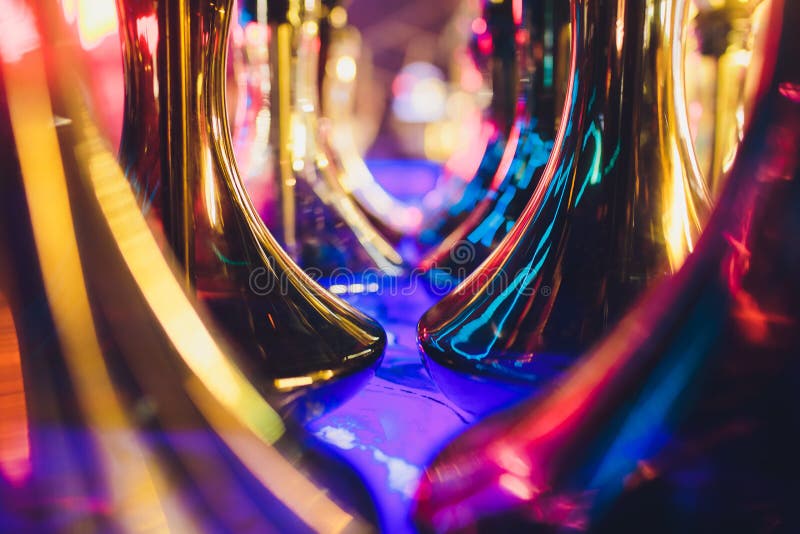 Empty Glass Hookahs Under the Light of Neon Against the Background of