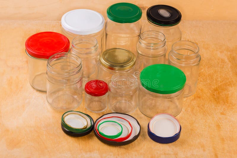 Empty Glass Jars Different Sizes with Appropriate Lids for Them Stock