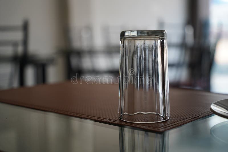 Empty Glass Upside Down on a Table Stock Photo Image of clean, table