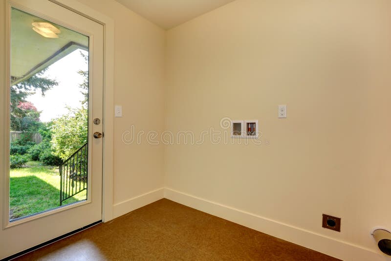 Empty hallway with glass door to backyard