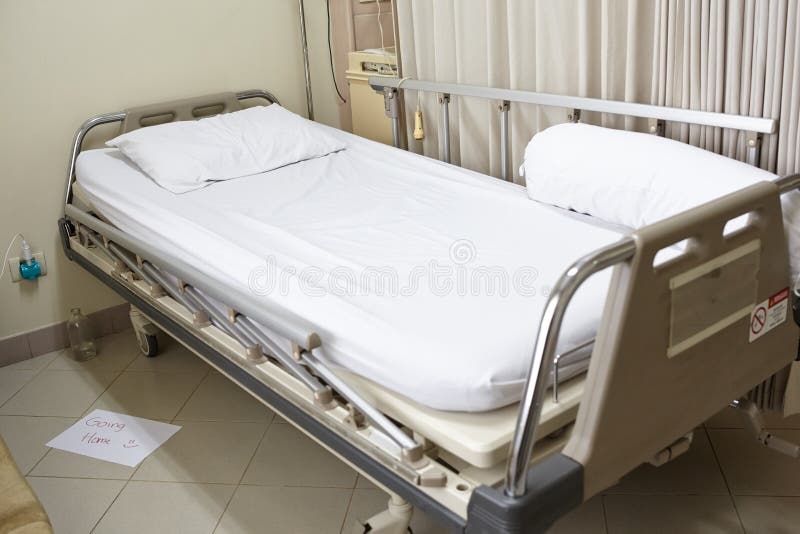Empty hospital bed royalty free stock photos