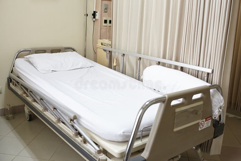 Empty hospital bed royalty free stock photography