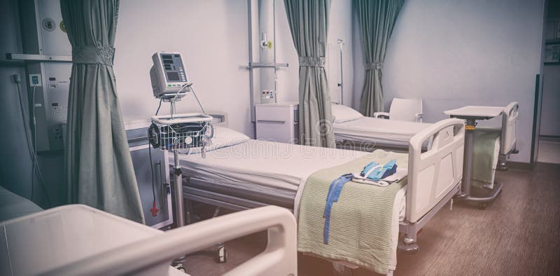 Empty hospital beds in hospital stock photography